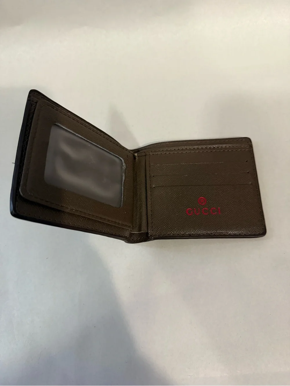 GUCCI Brown GG Supreme Canvas Bifold Wallet Pre-owned.